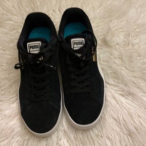 Black and white Puma Sneakers